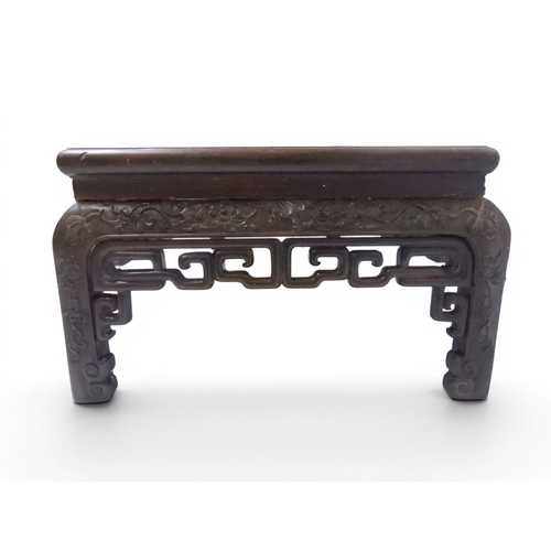 2005 - A LATE 19TH CENTURY CHINESE ROSEWOOD FRAMED OPIUM/COFFEE TABLE with rectangular marble inset top ove... 