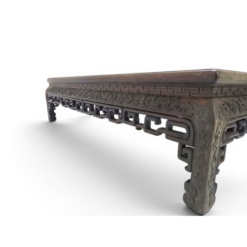 2005 - A LATE 19TH CENTURY CHINESE ROSEWOOD FRAMED OPIUM/COFFEE TABLE with rectangular marble inset top ove... 
