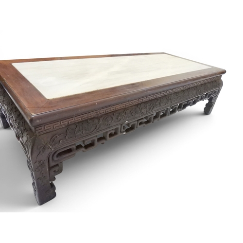 2005 - A LATE 19TH CENTURY CHINESE ROSEWOOD FRAMED OPIUM/COFFEE TABLE with rectangular marble inset top ove... 