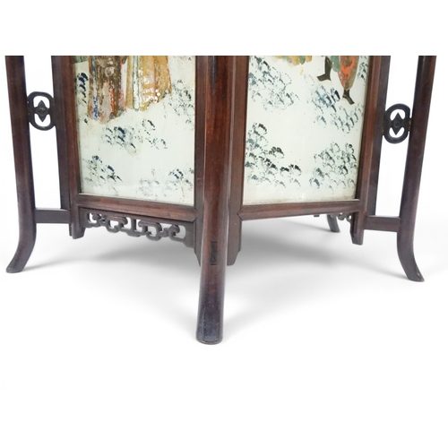 2006 - A LATE 19TH CENTURY CHINESE HARDWOOD FRAMED HEXAGONAL GLAZED LANTERNwith carved pierced frameworks a... 