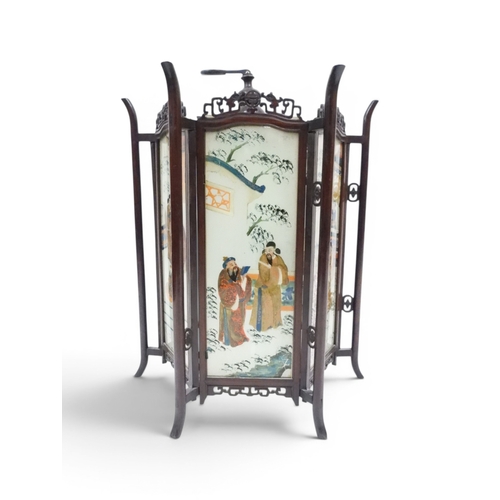 2006 - A LATE 19TH CENTURY CHINESE HARDWOOD FRAMED HEXAGONAL GLAZED LANTERNwith carved pierced frameworks a... 