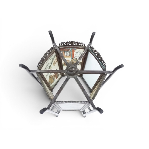 2006 - A LATE 19TH CENTURY CHINESE HARDWOOD FRAMED HEXAGONAL GLAZED LANTERNwith carved pierced frameworks a... 
