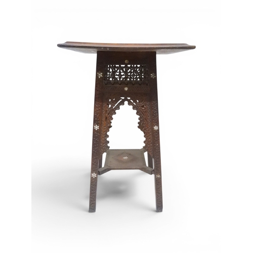 2008 - A LATE 19TH CENTURY MOORISH STYLE TWO TIER OCCASIONAL TABLE square top extensively carved with Arabi... 
