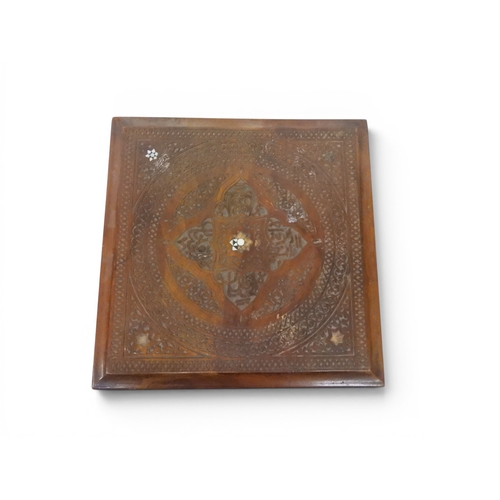 2008 - A LATE 19TH CENTURY MOORISH STYLE TWO TIER OCCASIONAL TABLE square top extensively carved with Arabi... 
