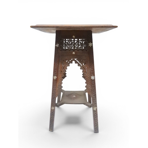 2008 - A LATE 19TH CENTURY MOORISH STYLE TWO TIER OCCASIONAL TABLE square top extensively carved with Arabi... 