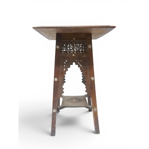 2008 - A LATE 19TH CENTURY MOORISH STYLE TWO TIER OCCASIONAL TABLE square top extensively carved with Arabi... 