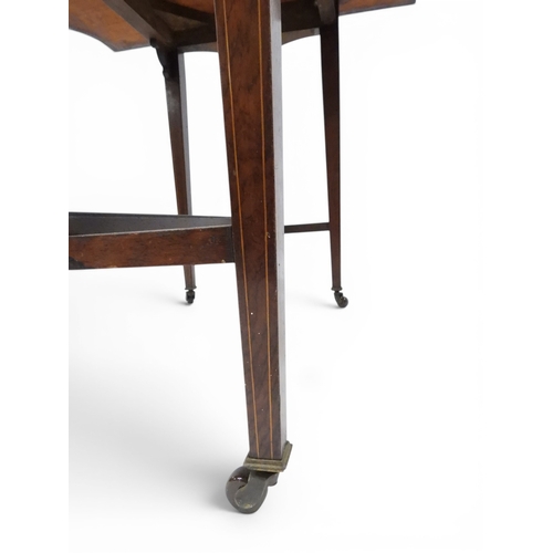 2016 - A VICTORIAN ROSEWOOD AND SATINWOOD INLAID FOLD-OVER CARD TABLE&nbsp;shaped top concealing baize line... 