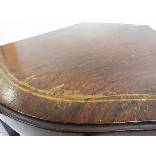 2016 - A VICTORIAN ROSEWOOD AND SATINWOOD INLAID FOLD-OVER CARD TABLE&nbsp;shaped top concealing baize line... 