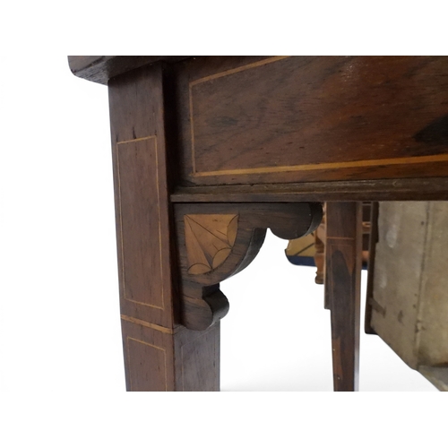 2016 - A VICTORIAN ROSEWOOD AND SATINWOOD INLAID FOLD-OVER CARD TABLE&nbsp;shaped top concealing baize line... 