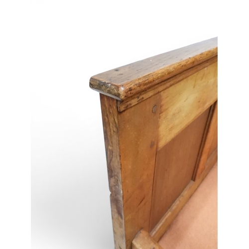 2021 - AN 18TH CENTURY OAK FIVE PANEL BACK SETTLEwith shaped scroll arms flanking later upholstered drop in... 