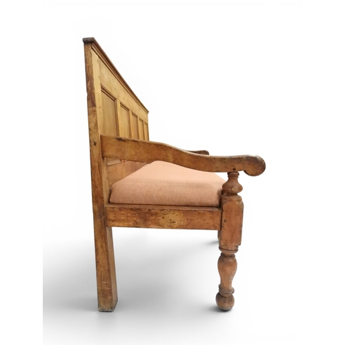2021 - AN 18TH CENTURY OAK FIVE PANEL BACK SETTLEwith shaped scroll arms flanking later upholstered drop in... 