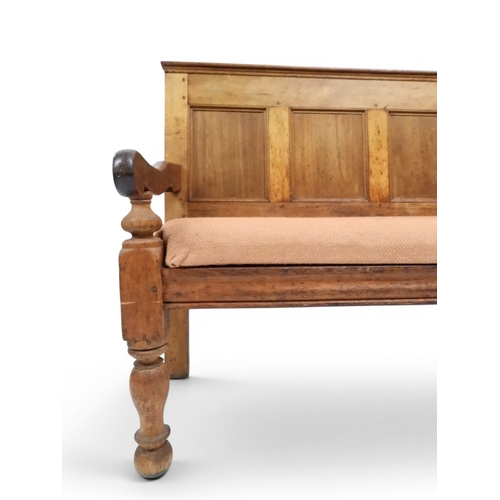 2021 - AN 18TH CENTURY OAK FIVE PANEL BACK SETTLEwith shaped scroll arms flanking later upholstered drop in... 