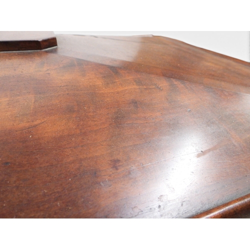2057 - A 19TH CENTURY MAHOGANY SARCOPHAGUS FORM CELLARETTE with lead lined interior and carved scrolled can... 