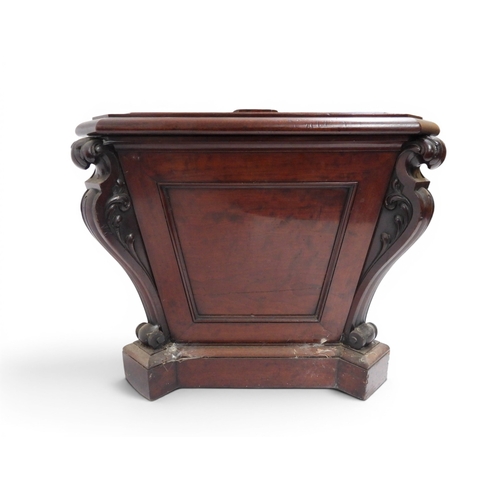 2057 - A 19TH CENTURY MAHOGANY SARCOPHAGUS FORM CELLARETTE with lead lined interior and carved scrolled can... 