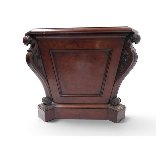2057 - A 19TH CENTURY MAHOGANY SARCOPHAGUS FORM CELLARETTE with lead lined interior and carved scrolled can... 