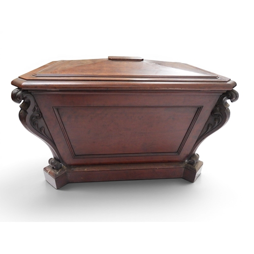 2057 - A 19TH CENTURY MAHOGANY SARCOPHAGUS FORM CELLARETTE with lead lined interior and carved scrolled can... 