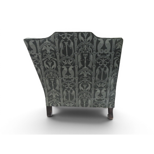 2058 - A LATE 19TH CENTURY GREEN UPHOLSTERED HUMPBACK SETTEE&nbsp;with raised arms on carved scrolled front... 