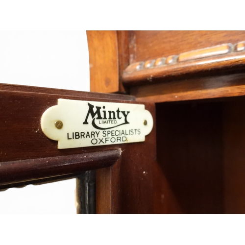 2003 - AN EARLY 20TH CENTURY MAHOGANY MINTY LIMITED, OXFORD FIVE TIER SECTIONAL BOOKCASEwith four pairs of ... 