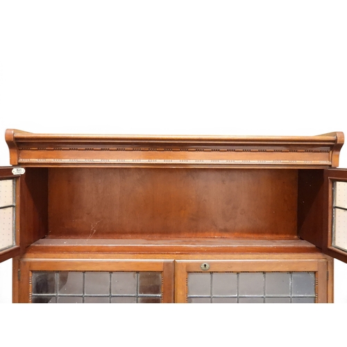 2003 - AN EARLY 20TH CENTURY MAHOGANY MINTY LIMITED, OXFORD FIVE TIER SECTIONAL BOOKCASEwith four pairs of ... 