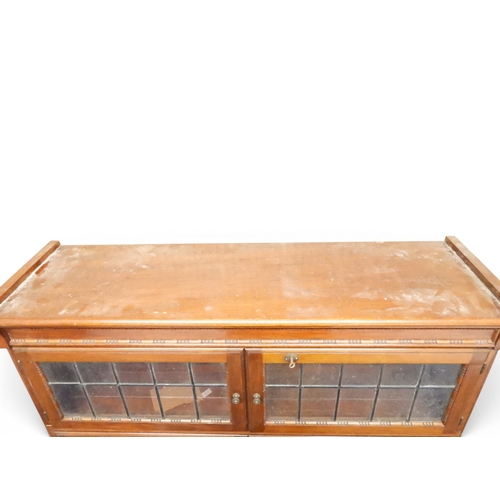 2003 - AN EARLY 20TH CENTURY MAHOGANY MINTY LIMITED, OXFORD FIVE TIER SECTIONAL BOOKCASEwith four pairs of ... 