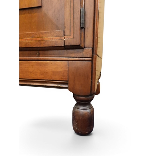 2003 - AN EARLY 20TH CENTURY MAHOGANY MINTY LIMITED, OXFORD FIVE TIER SECTIONAL BOOKCASEwith four pairs of ... 