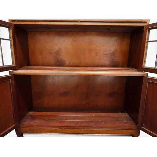 2003 - AN EARLY 20TH CENTURY MAHOGANY MINTY LIMITED, OXFORD FIVE TIER SECTIONAL BOOKCASEwith four pairs of ... 