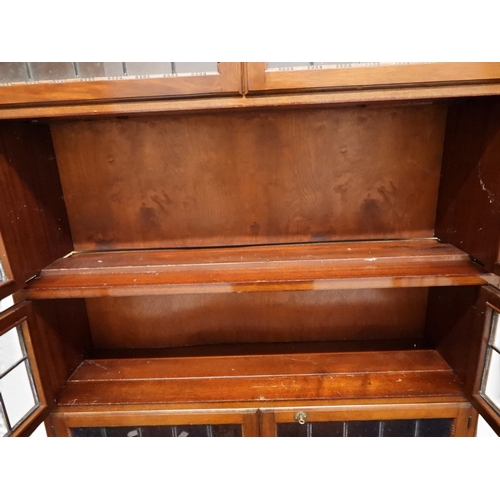 2003 - AN EARLY 20TH CENTURY MAHOGANY MINTY LIMITED, OXFORD FIVE TIER SECTIONAL BOOKCASEwith four pairs of ... 