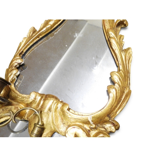 2013 - A PAIR OF 19TH CENTURY GILT GESSO FRAMED GIRANDOLE WALL MIRRORS&nbsp;with scrolled foliate decorated... 