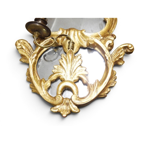 2013 - A PAIR OF 19TH CENTURY GILT GESSO FRAMED GIRANDOLE WALL MIRRORS&nbsp;with scrolled foliate decorated... 