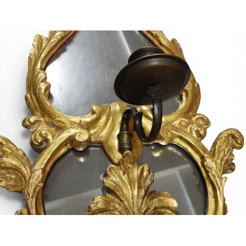 2013 - A PAIR OF 19TH CENTURY GILT GESSO FRAMED GIRANDOLE WALL MIRRORS&nbsp;with scrolled foliate decorated... 