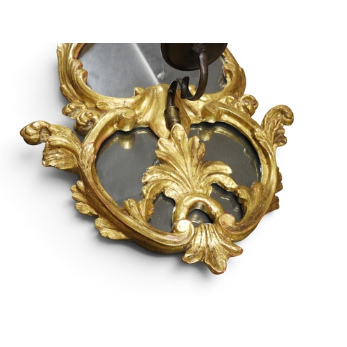 2013 - A PAIR OF 19TH CENTURY GILT GESSO FRAMED GIRANDOLE WALL MIRRORS&nbsp;with scrolled foliate decorated... 