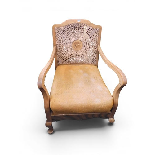 12 - An early 20th century walnut framed bergere three piece suite consisting two seat settee, 83cm high ... 