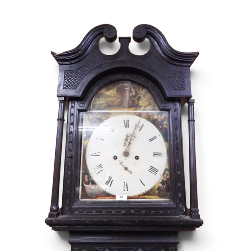 23 - A 19th century carved stained oak baronial style longcase clock with painted arched face with 