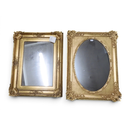 54 - A lot comprising two assorted late 19th century gilt gesso framed rectangular wall mirrors, largest ... 