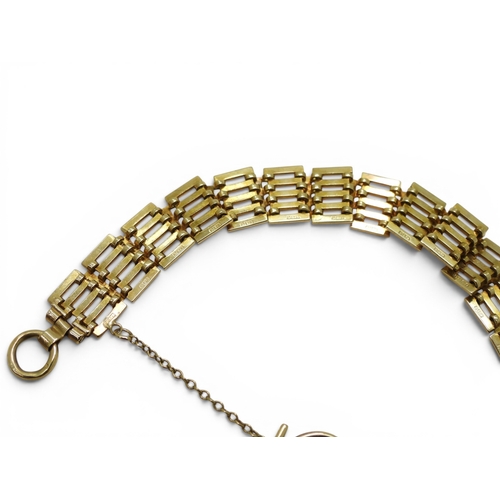 706 - A 9ct gold gate bracelet, with heart shaped clasp, length 18.5cm, weight 16.1gms