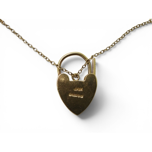 706 - A 9ct gold gate bracelet, with heart shaped clasp, length 18.5cm, weight 16.1gms