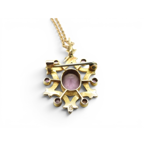710 - A 9ct gold Edwardian amethyst and pearl pendant/brooch, length 4cm, together with a 45cm yellow meta... 