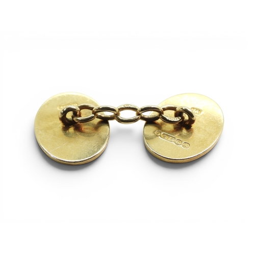 711 - *WITHDRAWN* A pair of 9ct gold Heraldic cufflinks, hand engraved with a bull's head and dates 1940 -... 