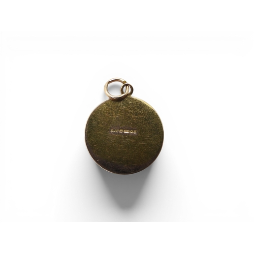 712 - A collection of 9ct gold items, a wishbone pendant, a tricolour bracelet, a 'J' pendant and a St. Ch... 