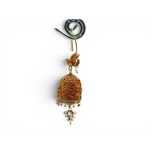 713 - A pair of yellow metal filigree and wire work earrings in the shape of a bell surmounted by a bird, ... 