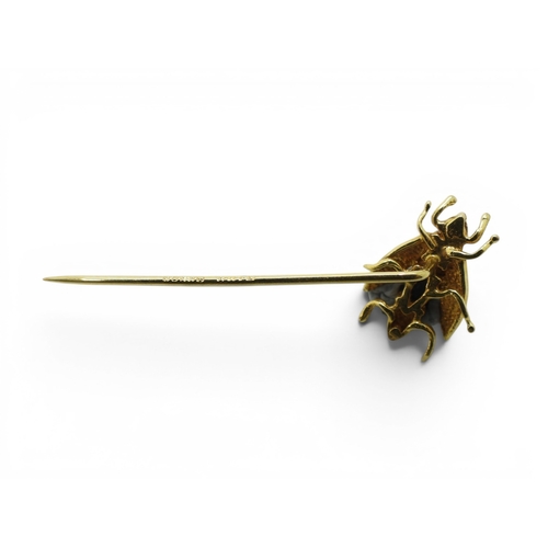 716 - A 15ct gold bar brooch length 4.8cm, weight 2.4gms, together with a 9ct gold brooch in the shape of ... 