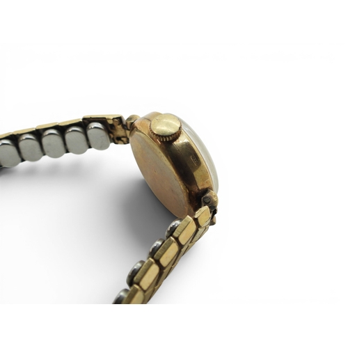 721 - Two 9ct cased ladies watches, a Rotary and a Herald, weight together with mechanisms and gold plated... 