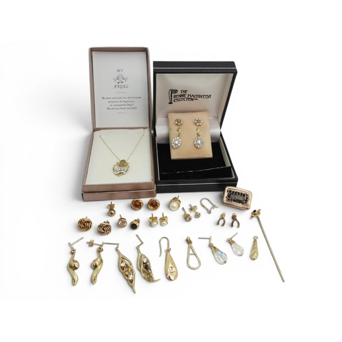 732 - A 9ct gold Nan pendant together with a collection of gold and yellow metal earrings, a mourning broo... 