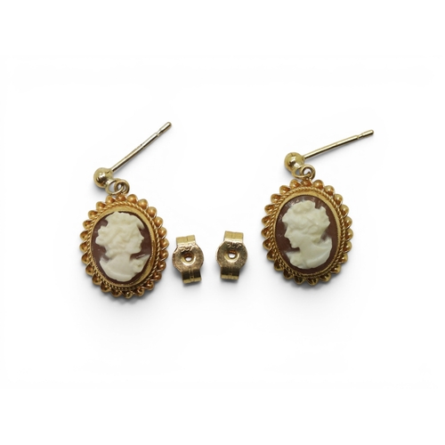 733 - Two 9ct gold cameo brooches with similar earrings, weight combined 15.7gms, together with a yellow m... 