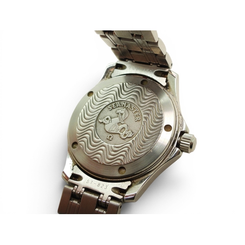 735 - A stainless steel Omega Seamaster, Automatic, Chronometer, with metallic blue wavy pattern dial, and... 