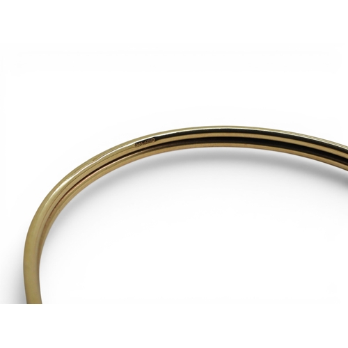 738 - A 9ct gold bangle, weight 5.4gms