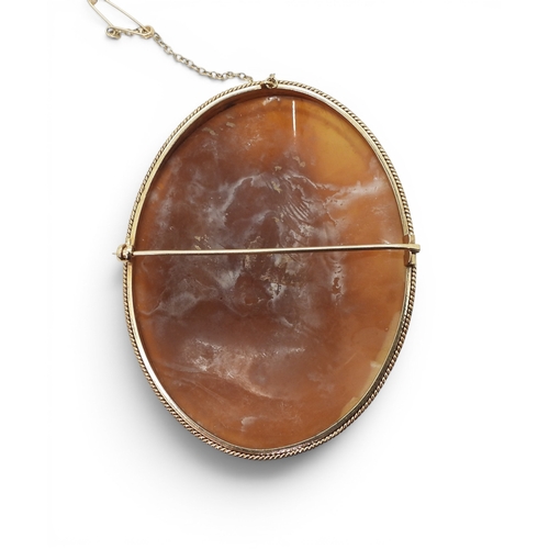 744 - A large 9ct gold mounted cameo brooch, dimensions 8cm x 6cm, weight 31.1gms