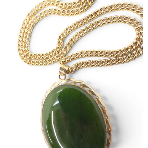 745 - A 9ct gold Italian made UnoAErre 40cm curb chain, weight 14.6gms, together with a 14k gold green har... 
