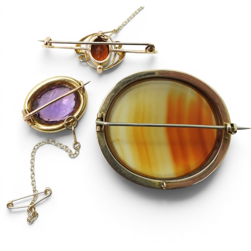750 - A 15ct gold amethyst and pearl brooch, weight 6.2gms, a 9ct gold Art Nouveau brooch set with split p... 