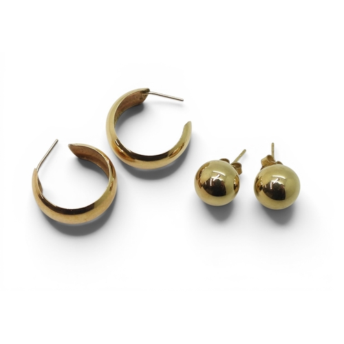 753 - A pair of 9ct gold large ball stud earrings, together with a pair of 9ct creole earrings, weight com... 